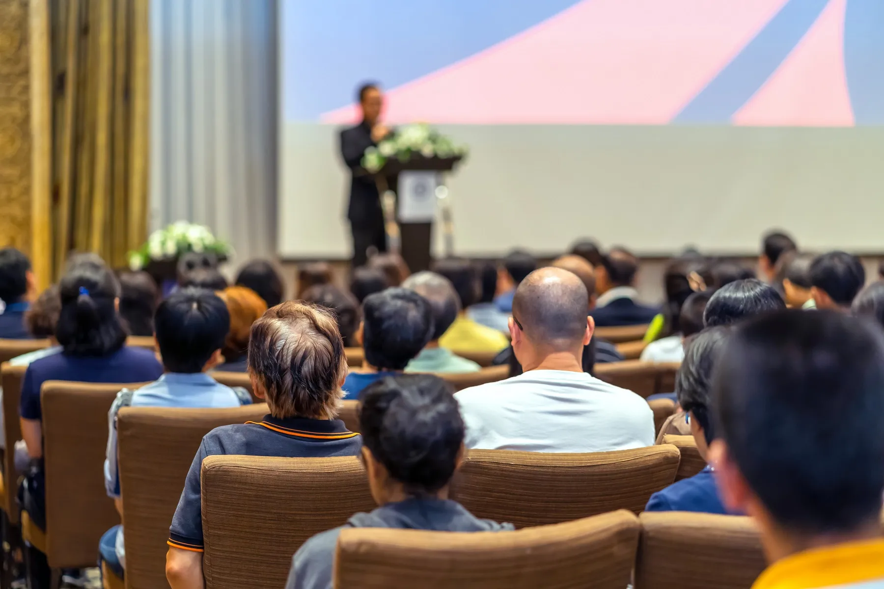 Corporate audience at a sales training event
